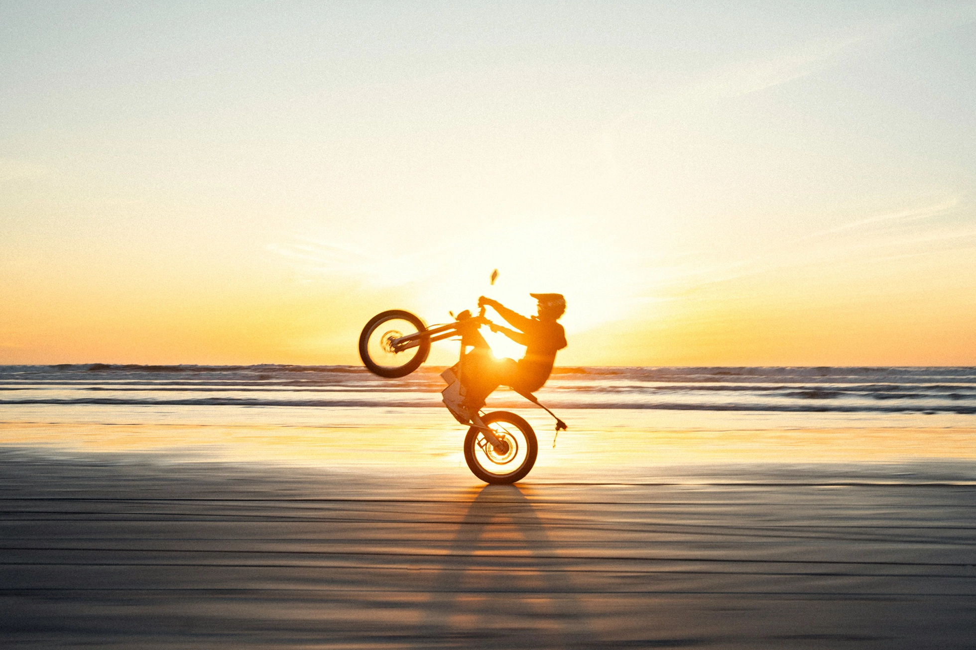 motorcycle on florida beach at sunset