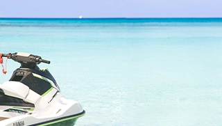 Jet ski covered by personal watercraft insurance in crystal clear Florida water